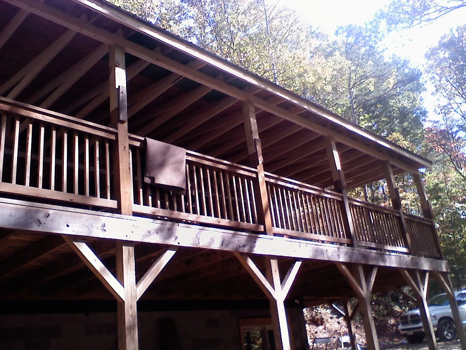 Timber framing under a new elevated porch and deck — Roof Leak Repair in Corrales by Roofing Brothers